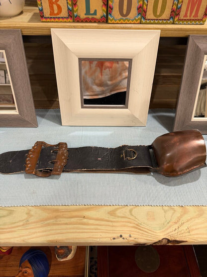 bell on leather strap