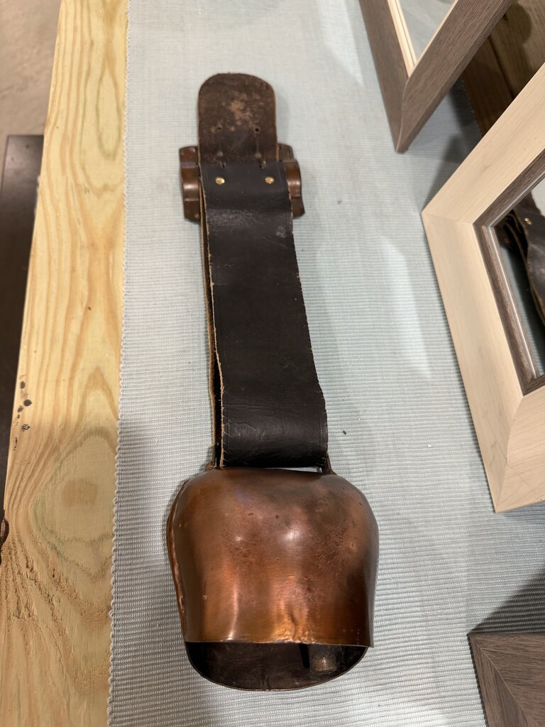 bell on leather strap