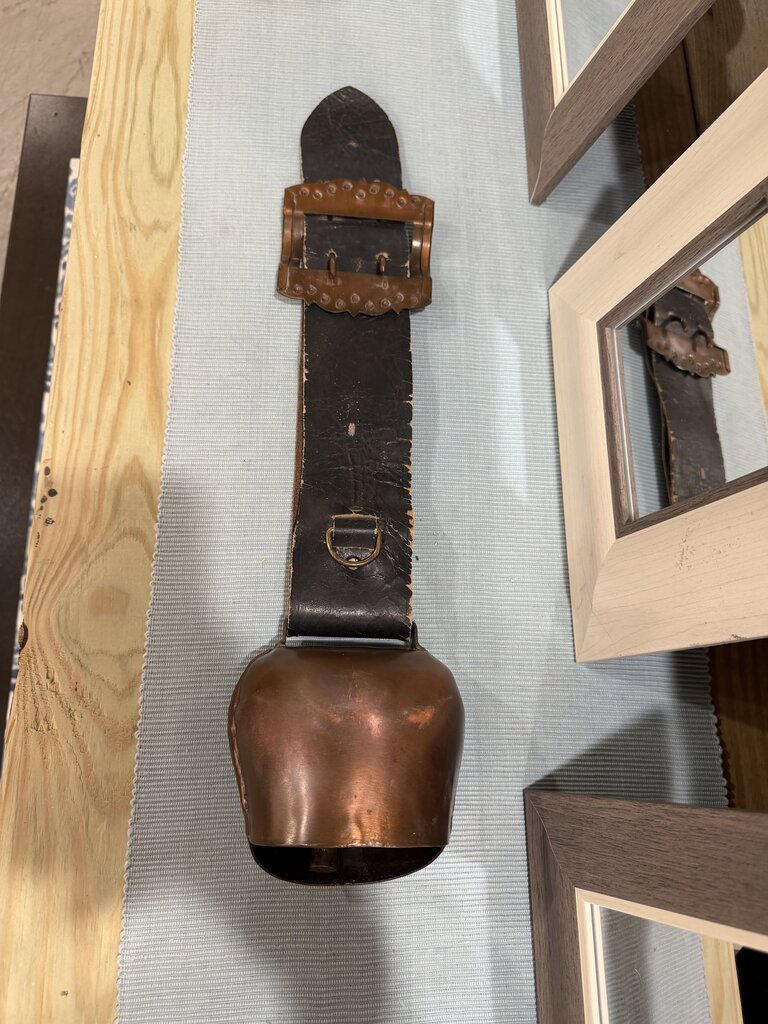 bell on leather strap
