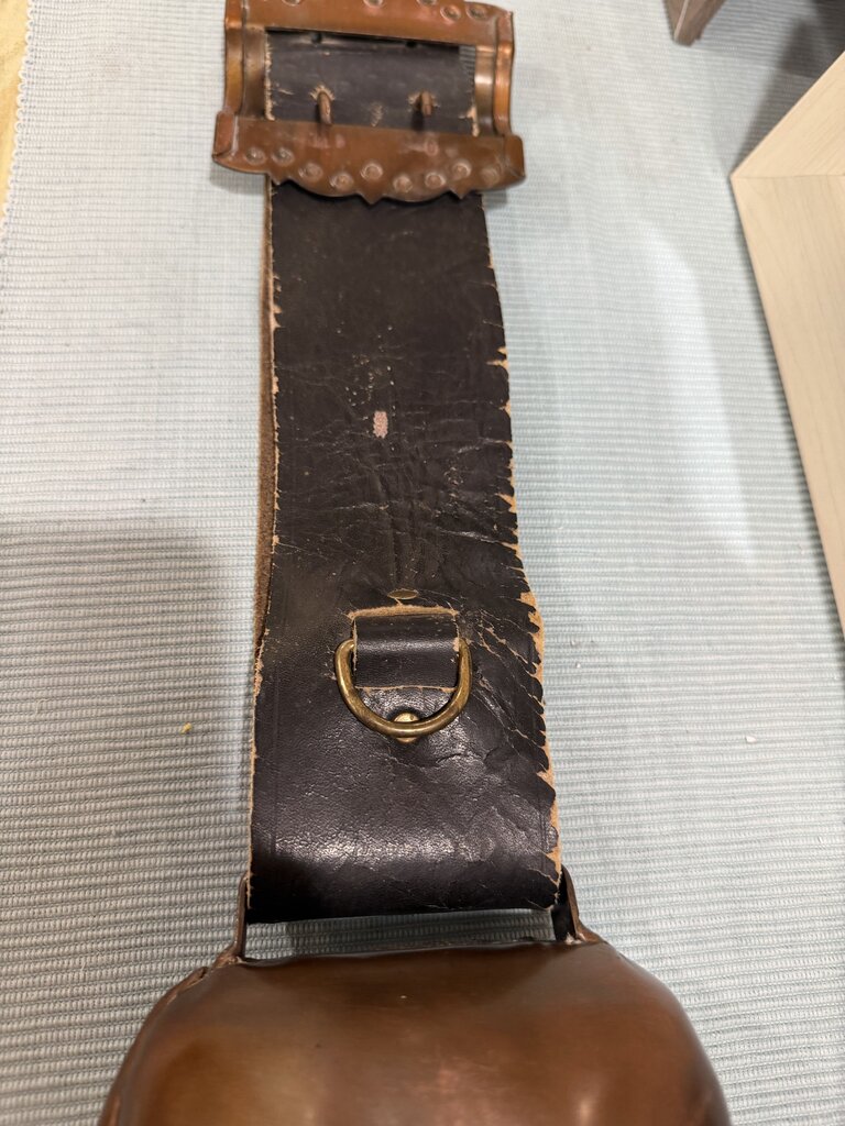 bell on leather strap